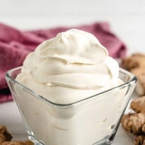 A bowl of Fresh Ginger Whipped Cream whipped cream with ginger in it.