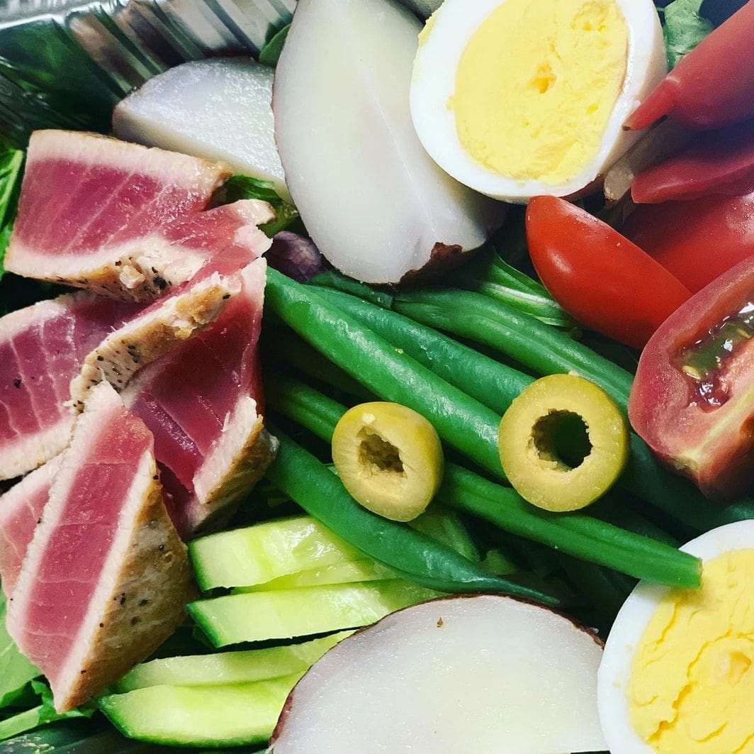 A Tuna Nicoise Salad with green beans and eggs.