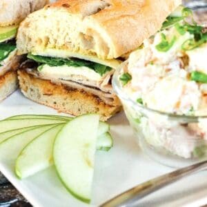 Two Stonewood Turkey Breast on a plate with a side of apple salad.