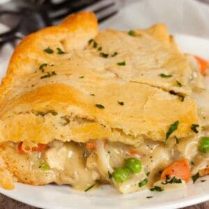 Chicken Pot Pie on a plate with a fork.